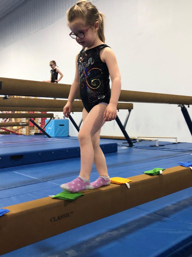 A child on a balance beam