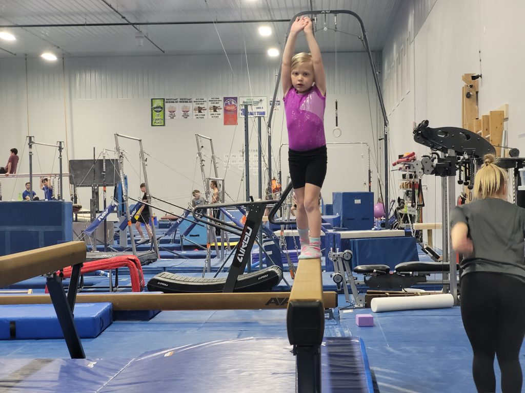 A child on a balance beam