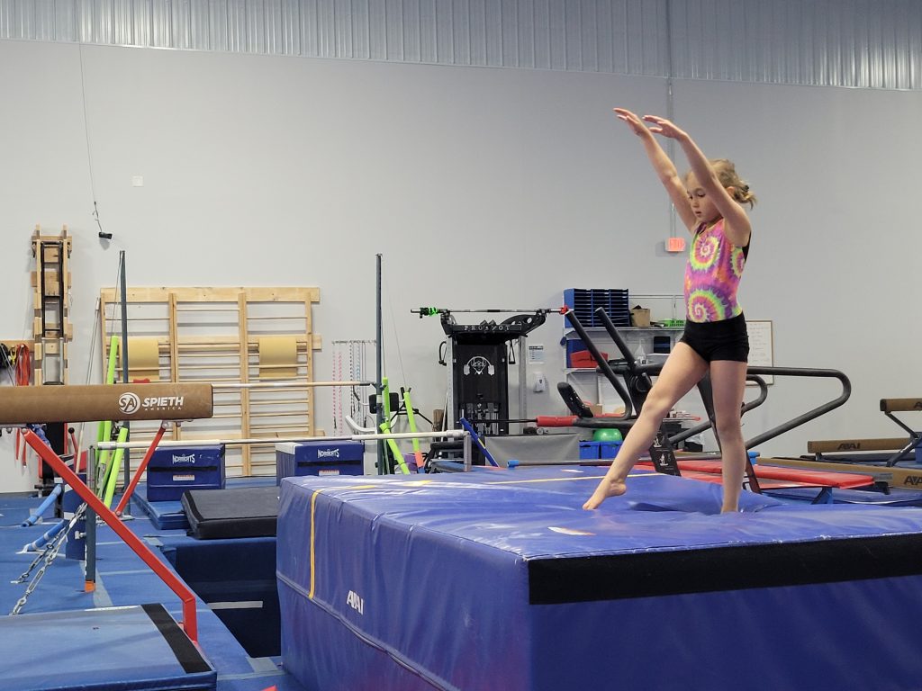 A girl practicing gymnastics