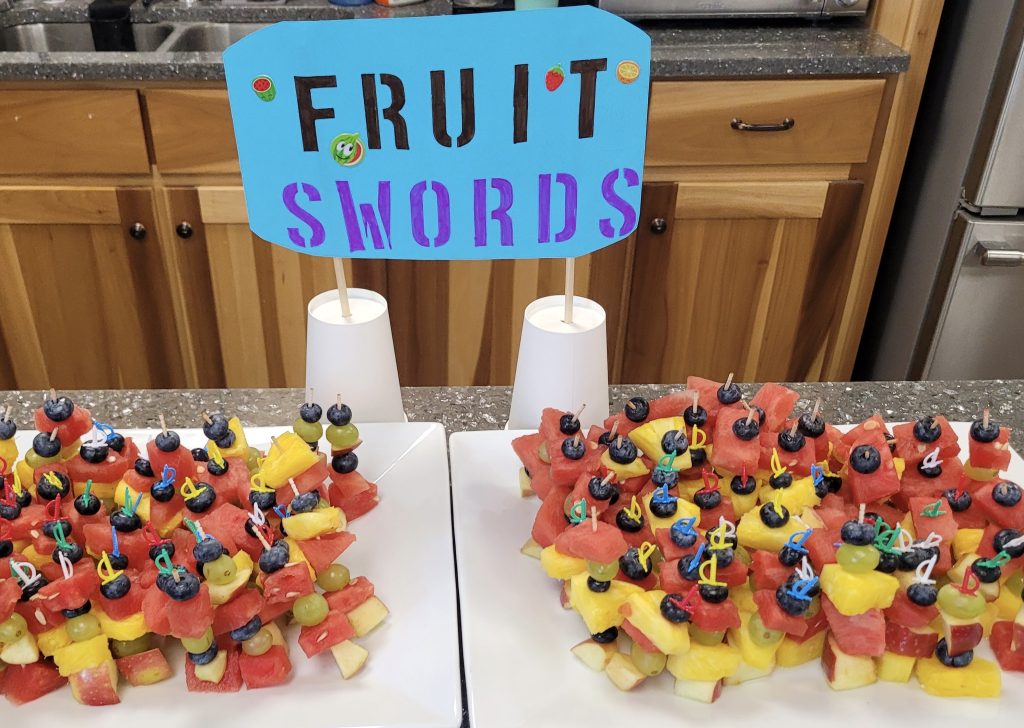 Camp Roga snack - fruit swords (bowls of fruit)