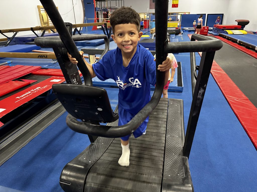 A child with a treadmill at Kids Night Out