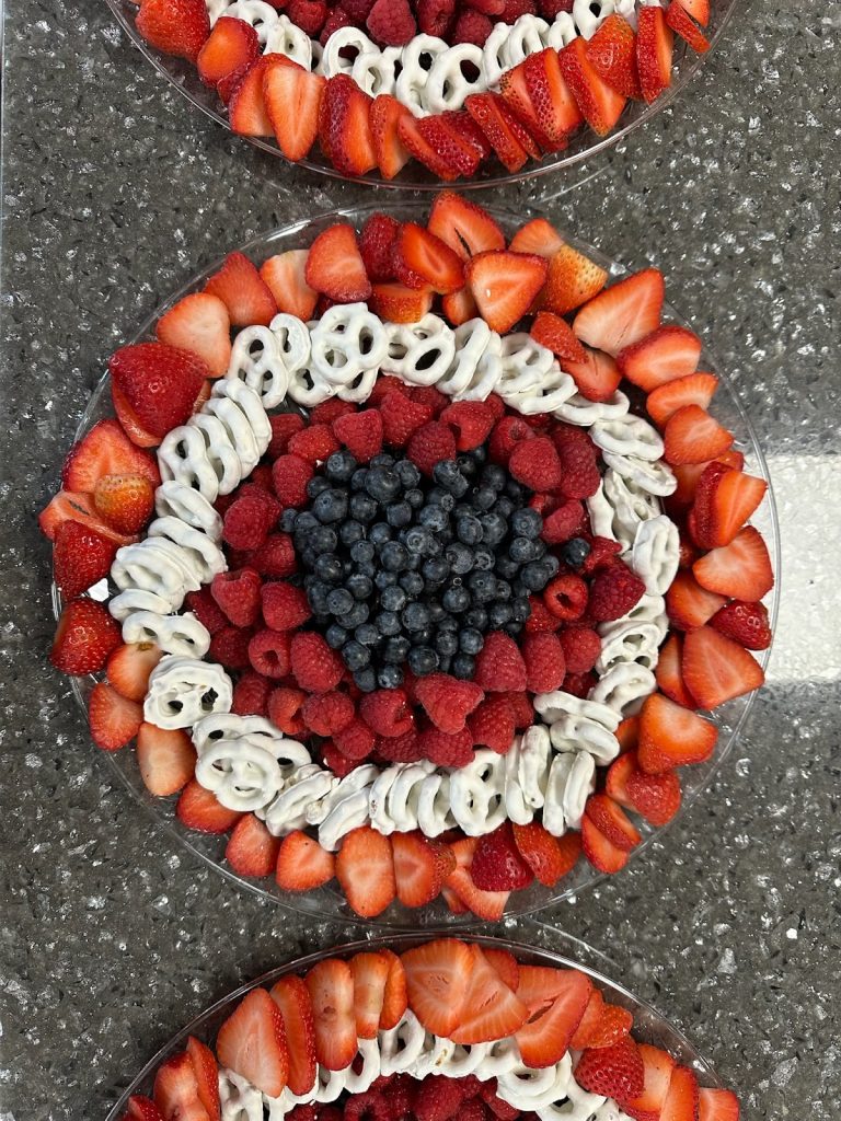 A snack at Camp ROGA featuring various berries and pretzels