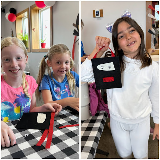 Girls showing off their Ninja pouch craft at Camp ROGA summer camp.
