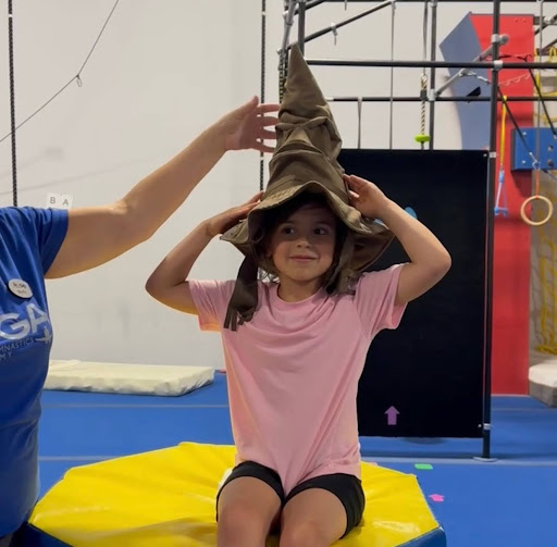 Girl wearing sorting hat