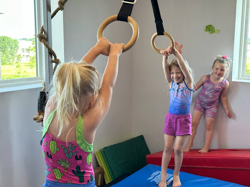 kids swinging in imaginary palm trees